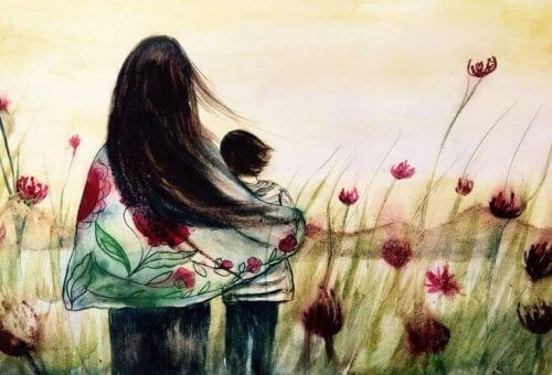 Moeder en kind in bloemenveld