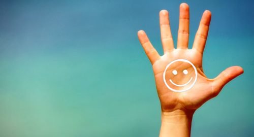 Hand met een smiley
