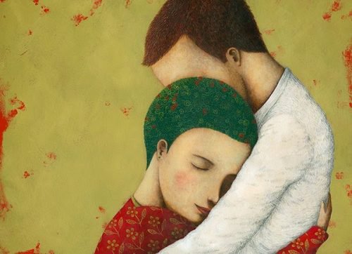 Man en vrouw die elkaar omhelzen