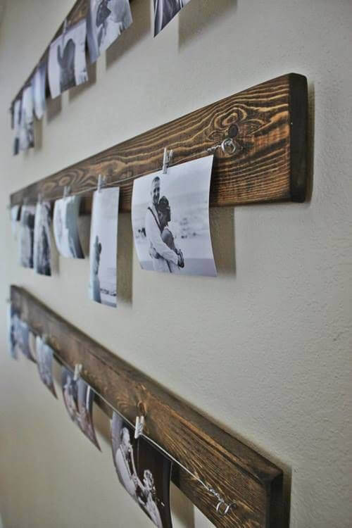 foto's aan een houten plank