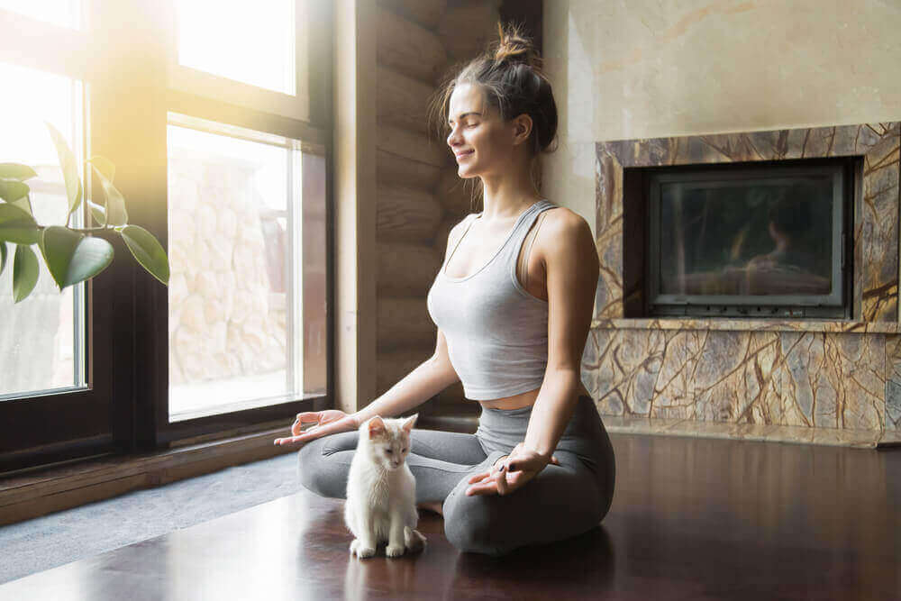 Eén van de bewegingsvormen die je zal doen beter voelen is yoga