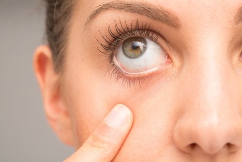 Vrouw met groen oog