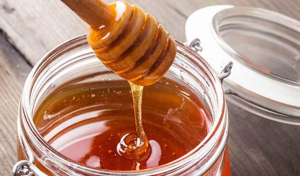glazen pot met honing