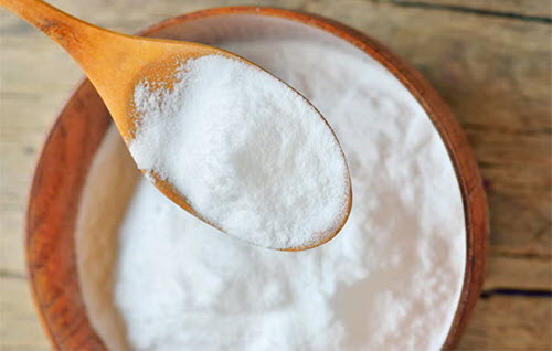 Kom en lepel met baking soda