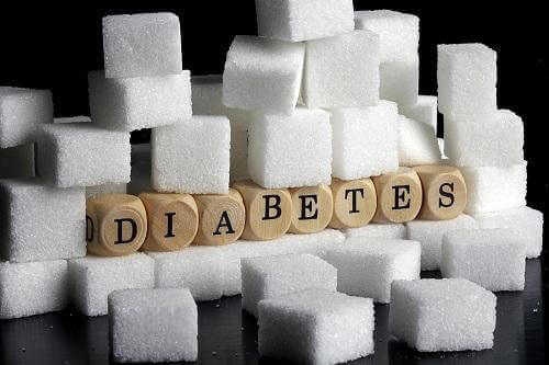 Suikerklontjes en letters die diabetes spellen