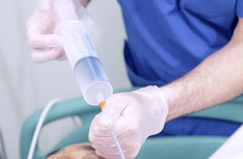 Wanneer moet een percutane endoscopische gastrostomie vervangen worden