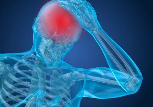 Een afbeelding van iemand met hoofdpijn waarbij de hersenen rood zijn gekleurd