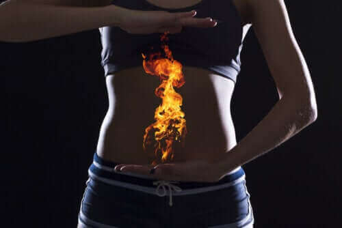 Waar wordt zure reflux door veroorzaakt?